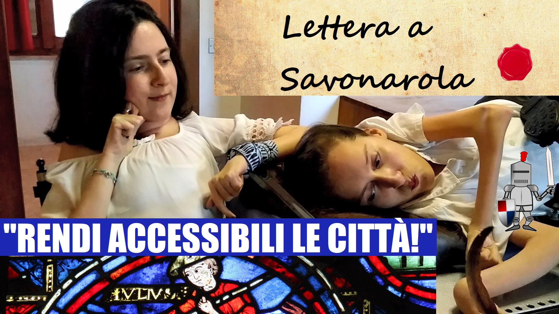 Maria Chiara e Elena sono una accanto all'altra in una stanza. Alle spalle hanno una finestra e davanti una scrivania. Elena scrive con una piuma, entrambe hanno l'aria concentrata. C'è la scritta "Lettera a Savonarola" e "Rendi accessibili le città!"
